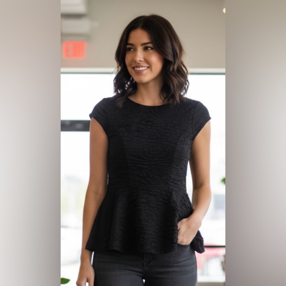 Bar III black stretchy top, flared at waist, mesh on back, great condition, XS